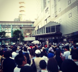 waiting in the crowd for trains