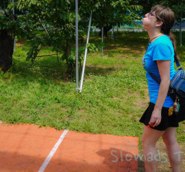 woman spitting cherry pits